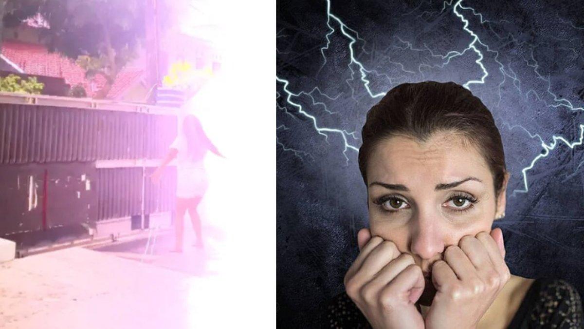 TEREKAM! Asyik Menari di Bawah Hujan, Wanita Ini Nyaris Celaka