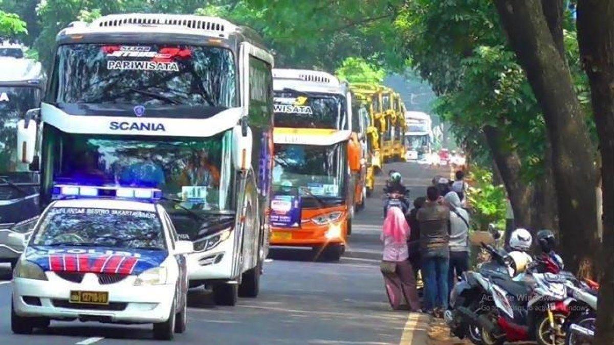 MUDIK GRATIS - Ilustrasi mudik jalur darat diunduh dari YouTube.com (15/2/2025). Daftar mudik gratis Lebaran 2025 kini sudah dibuka.