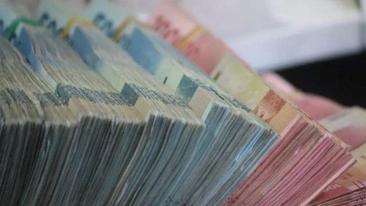 Ilustrasi uang Bansos pecahan 50 dan 100 ribu