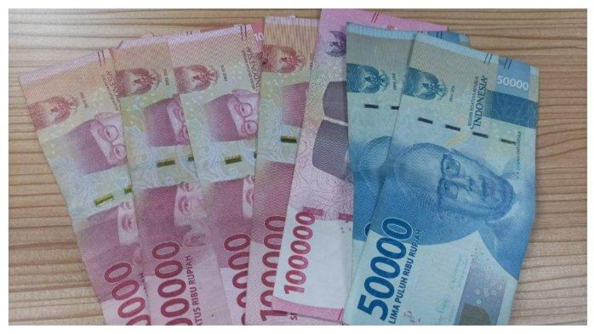 Ilustrasi uang bansos.