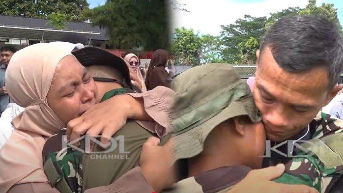ISAK TANGIS ORANG TUA - Tangkapan layar video KDM Channel. Isak tangis warnai masa akhir pendidikan disiplin para siswa di barak TNI Purwakarta, Jawa Barat, Minggu (18/5/2025).