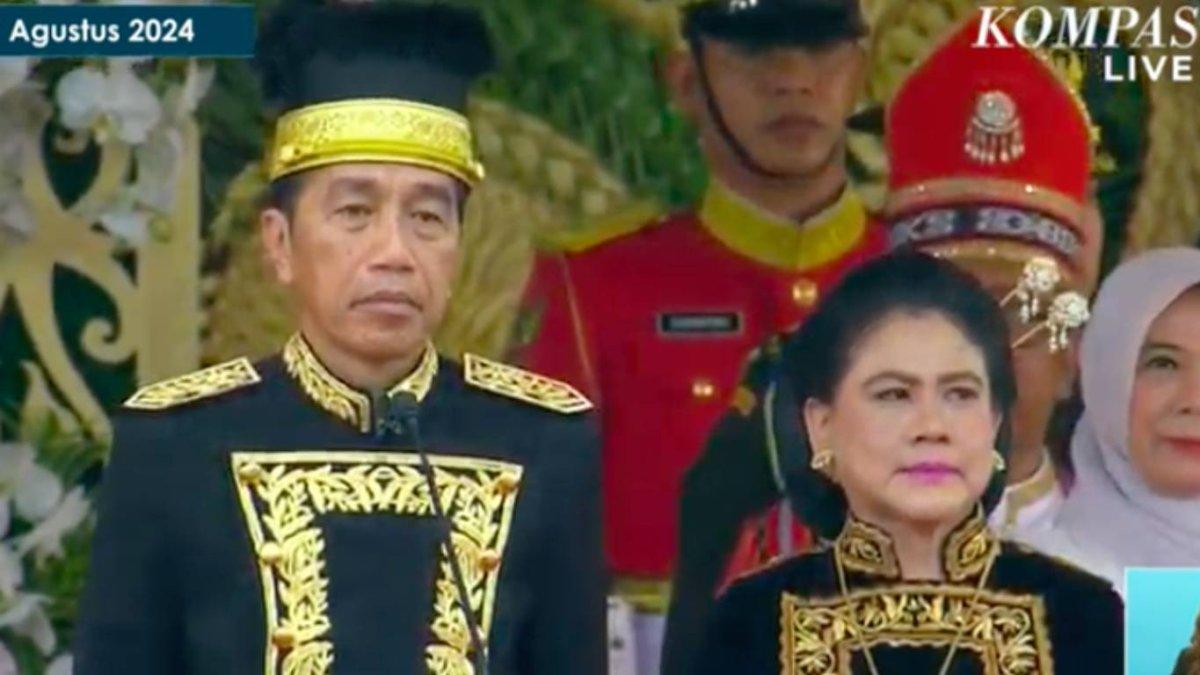 Jokowi mengenakan Kustin, pakaian adat dari Provinsi Kalimantan Timur