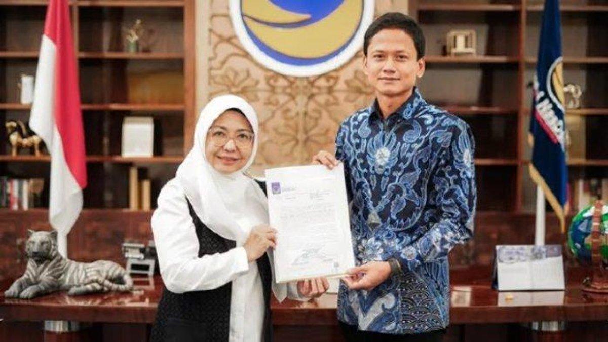100 HARI KERJA - KPU Kabupaten Pandeglang telah menetapkan pasangan Dewi-Iing Andri Supriadi sebagai Bupati dan Wakil Bupati Terpilih Kabupaten Pandeglang Periode 2025-2029.