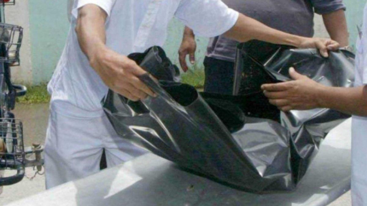 Kantong plastik hitam berisi kerangka manusia