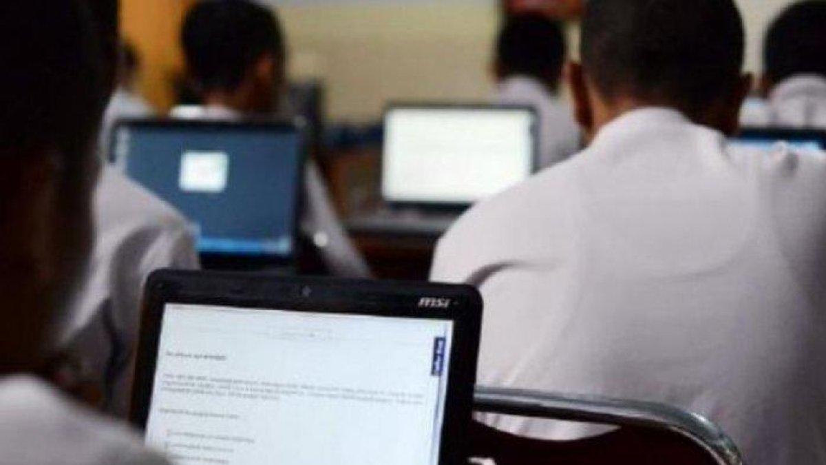 Ilustrasi ujian berbasis komputer.