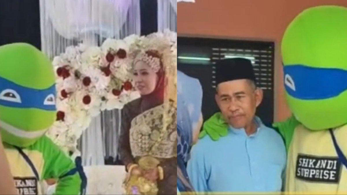 Momen pria diam-diam datang ke pernikahan mantan pacarnya menggunakan kostum badut