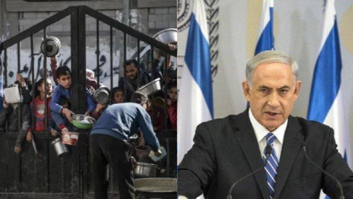 Warga Palestina berkumpul saat menunggu distribusi makanan di Rafah, Gaza selatan, pada bulan November. Netanyahu akan menyerang Rafah.