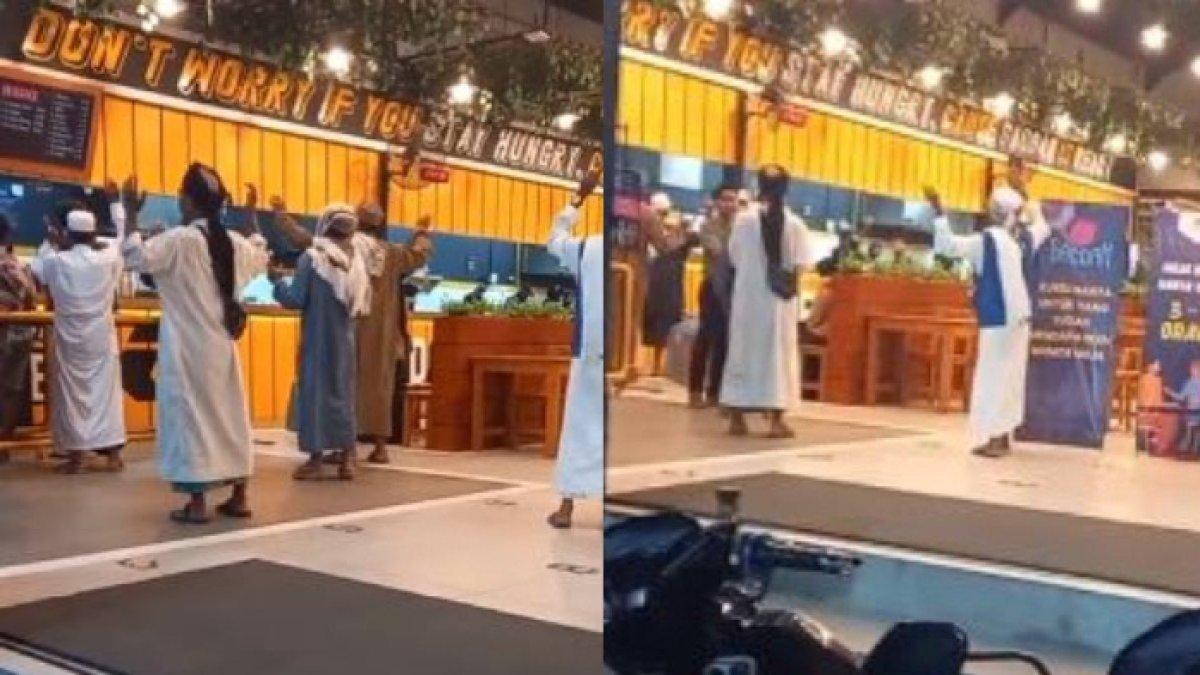Penampakan sekelompok pria bergamis dan bersorban seolah sedang meruqyah Warung Mie Gacoan di Madura