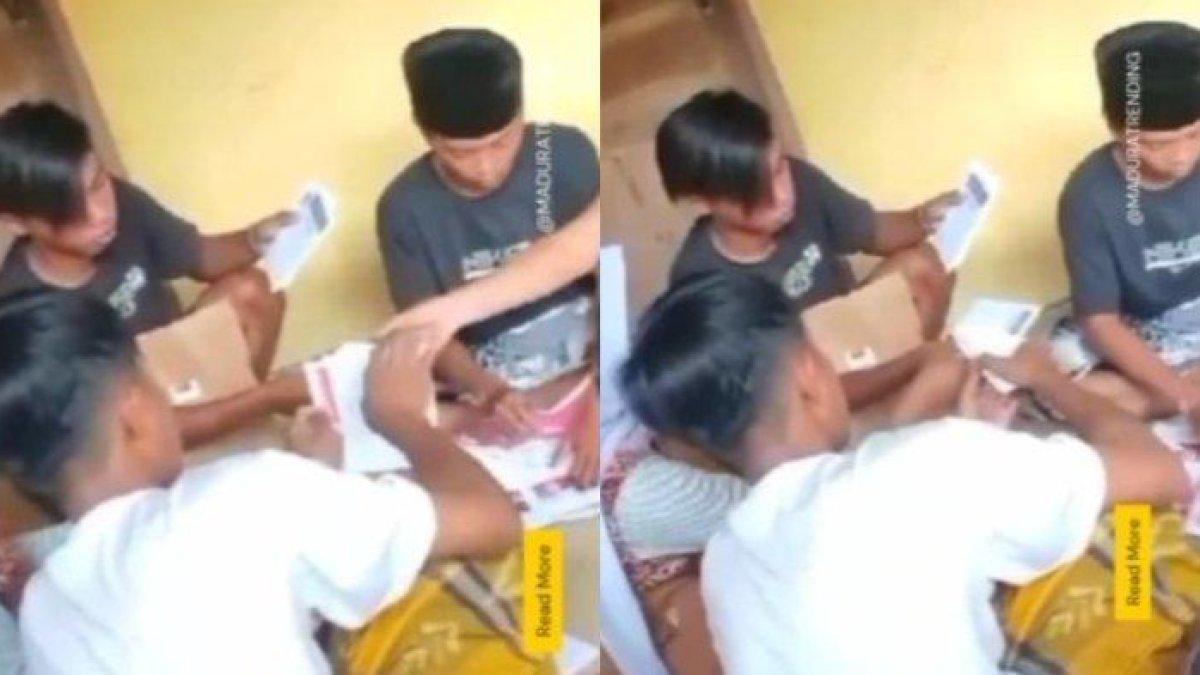 Sekelompok pemuda diduga mencoblos surat suara di luar Tempat Pemungutan Suara (TPS) pada pemilihan umum (Pemilu) 2024.