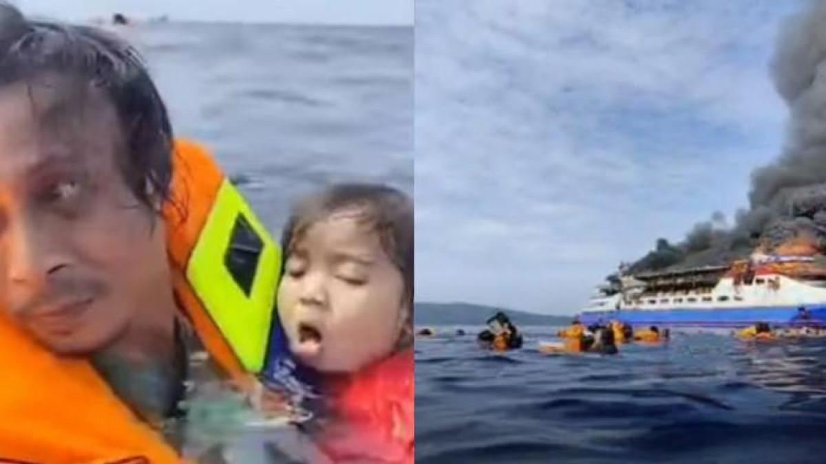 KECELAKAAN KAPAL - Seorang lelaki menyelamatkan penumpang anak kecil saat kecelakaan kebakaran KM Barcelona VA, di Perairan Pulau Talise, Minahasa Utara, Sulawesi Utara, Minggu (20/7/2025). Kapal tersebut diakabarkan mengangkut 280 penumpang saat kebakaran terjadi.