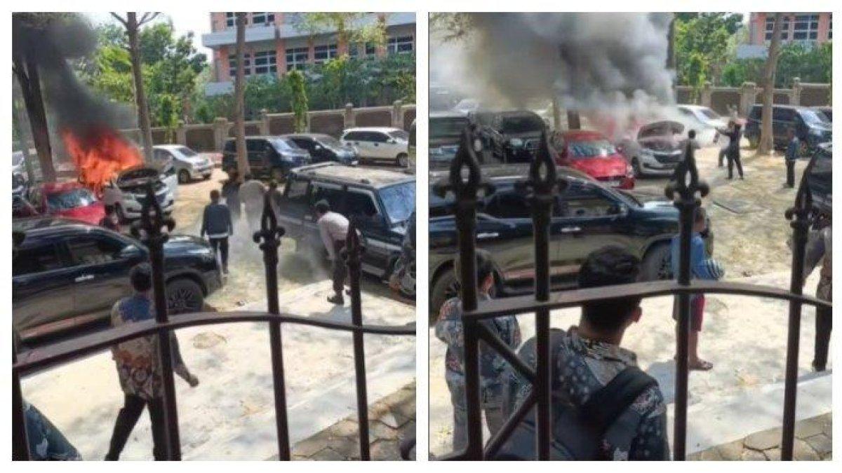 Tangkapan layar sebuah mobil terbakar di parkiran Institut Seni Indonesia (ISI) Surakarta, Rabu (18/10/2023).