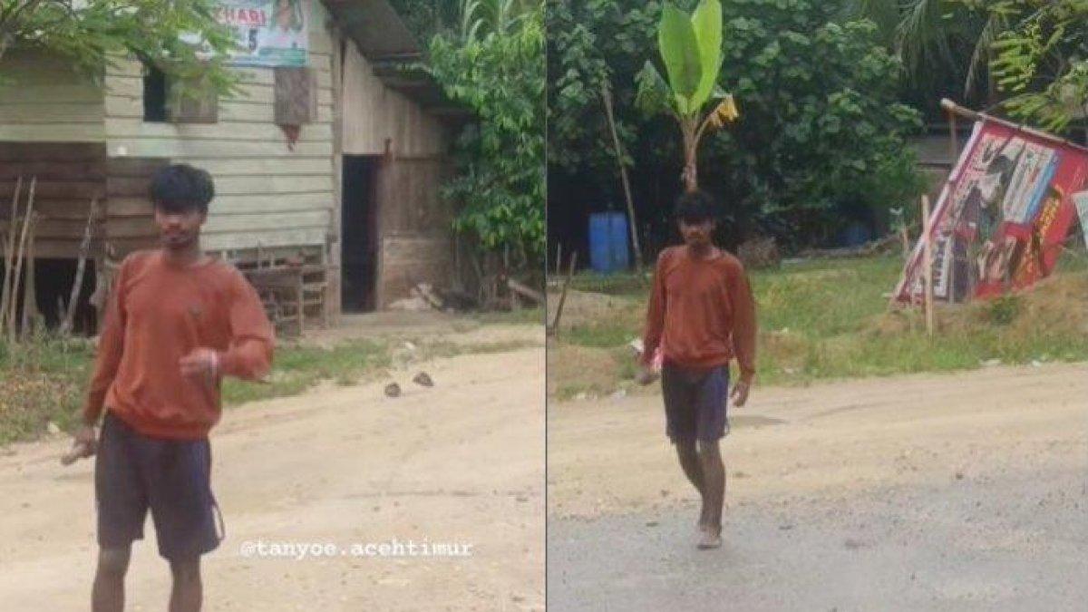 Tangkapan layar seorang pria melakukan perusakan ke