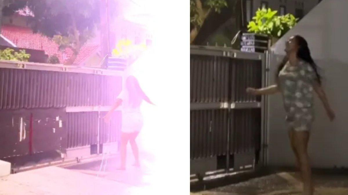 TEREKAM! Asyik Menari di Bawah Hujan, Wanita Ini Nyaris Celaka