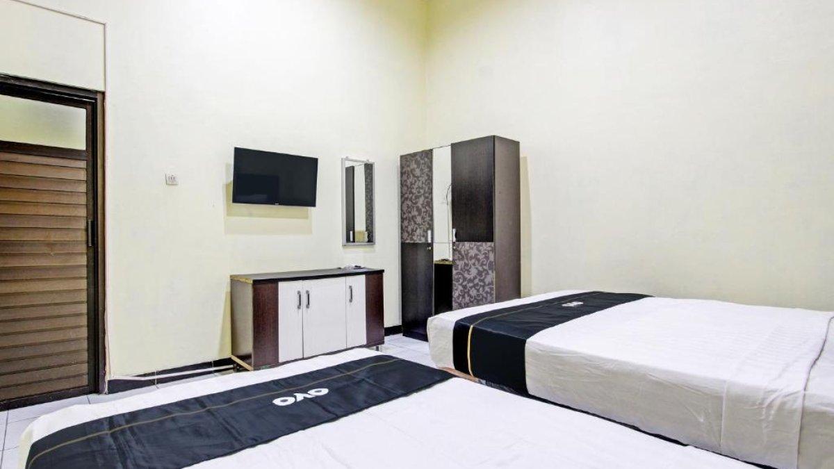 HOTEL MURAH KLATEN - Kamar penginapan di hotel murah Super OYO Capital O 93204 Hotel Mulia Dua Syariah Klaten.