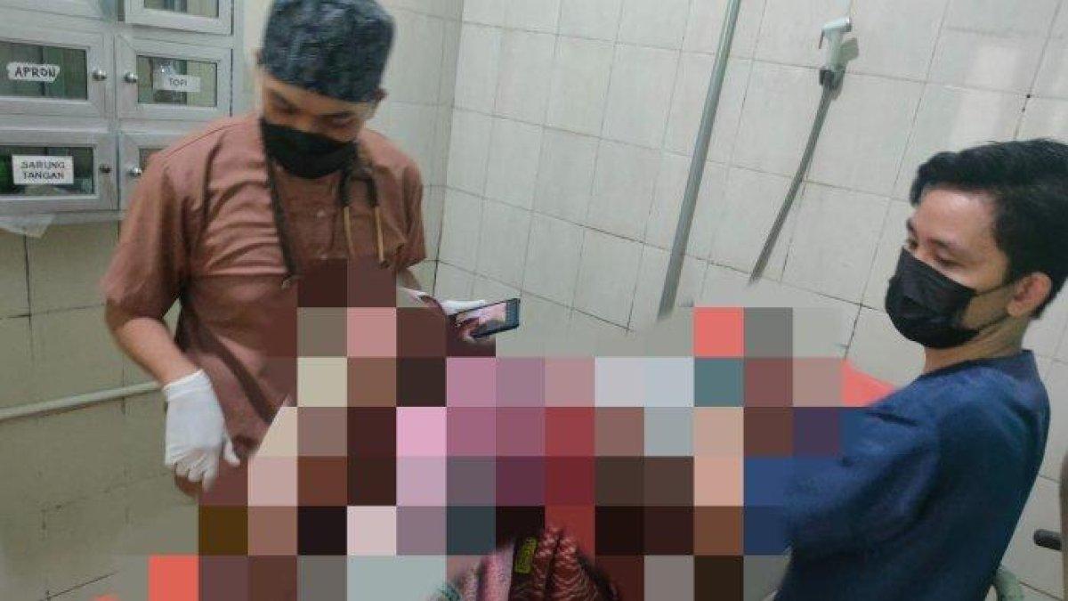 Istri Pujiono yang menjadi korban pembakaran rumah.