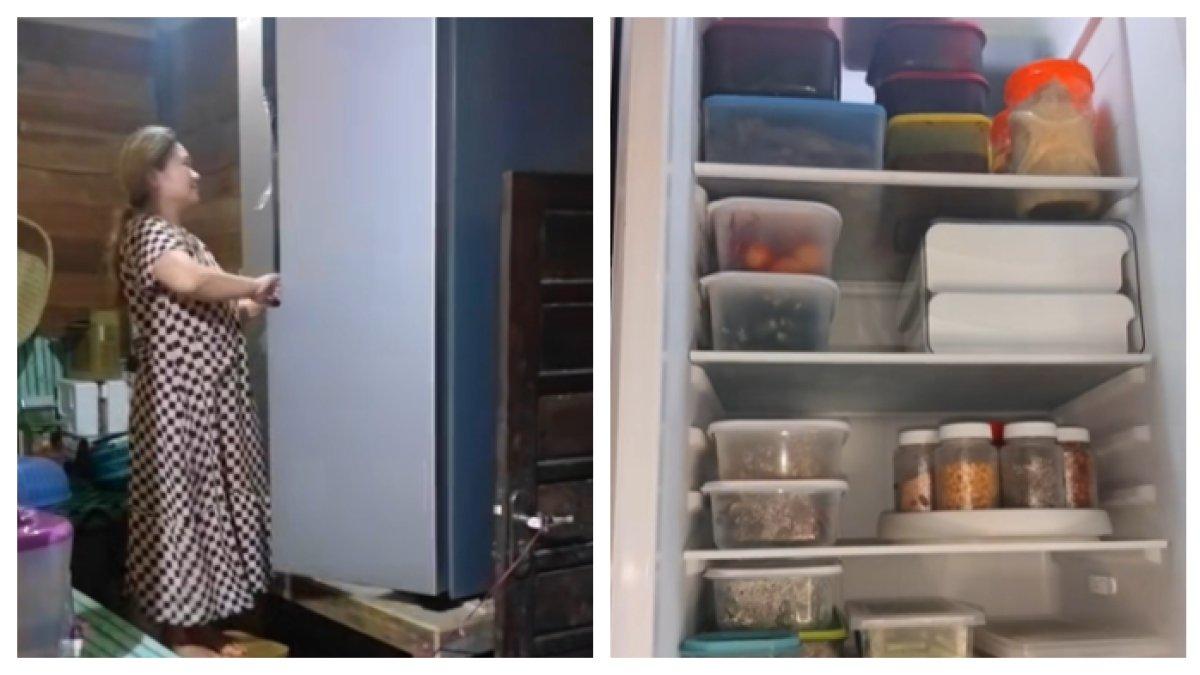 VIRAL KULKAS ELIT - Seorang wanita ini jadi bahan perbincangan di media sosial karena miliki kulkas pintu dua. Padahal rumahnya hanya terbuat dari kayu, sehingga banyak yang berkomentar.