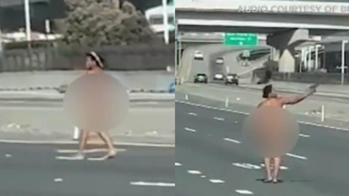 Seorang wanita tanpa busana nekat berlarian membawa pistol di jalan tol sembari menembaki pengendara mobil sekitarnya.