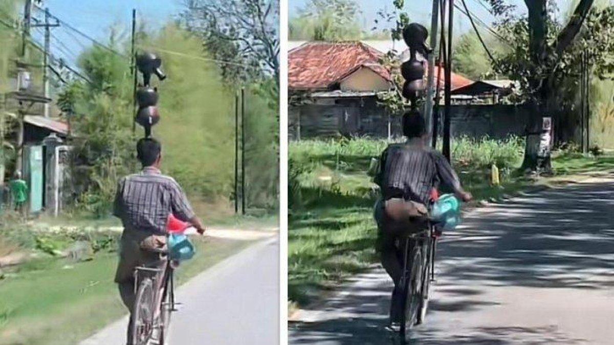 Sosok Lasto asal Blora ini mampu menyunggi tiga kendi di kepalanya sembari mengemudikan sepedanya.
