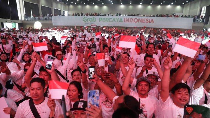Antusiasme Mitra Grab yang mengikuti rangkaian acara di Hari Mitra Grab & OVO yang digelar di
 Jakarta (26/8/2024)