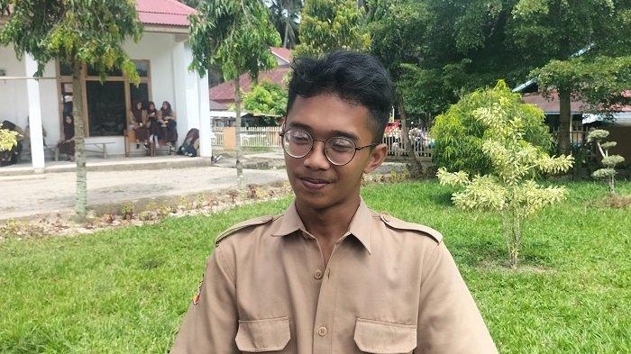 DAPAT ANCAMAN GURU - Ketua OSIS SMAN 1 Sungai Geringging, Kabupaten Padang Pariaman, Sumatera Barat, Giorg Agian Syava, Rabu (14/5/2025). Dia mengaku sempat mendapat ancaman dari pihak sekolah.