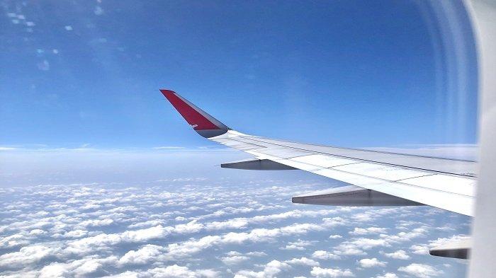 Ilustrasi: Suasana penerbangan saat travelling ke luar negeri