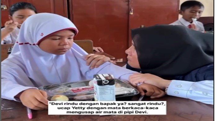 Devi, Sekolah Dasar Negeri 166 Palembang yang enggan makan siang gratis di sekolah. Ia memilih membawa makanan itu pulang ke rumah dan menyantapnya bersama sang ibu.(Tangkapan Layar Instagram @polisi_sumsel)