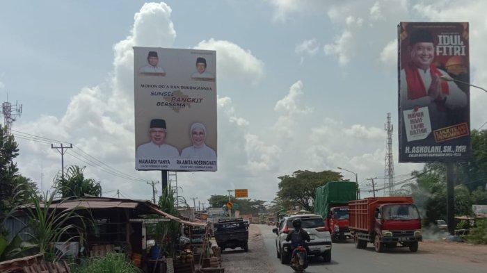 Salah satu baliho Mawardi-Anita yang tersebar di jalan Palembang-Betung.