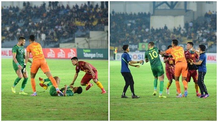 Penyerang anyar Sriwijaya FC asal Ukraina Yevhen Bokhashvili sebelum dikenakan kartu merah mencoba membela winger Fransiskus Alesandro  yang terguling di rumput pada laga kemenangan 0-1 atas tim tuan rumah PSPS Riau di Stadion Kaharuddin Nasution Pekanbaru, Kamis (30/11/2023) malam.