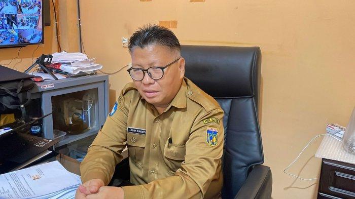 Kepala SMKN 2 Palu, Loddy Surentu