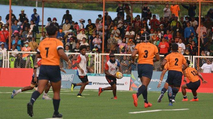 Pertandingan merebut medali emas rugby putera antara tuan rumah Papua Vs DKI Jakarta di venue rugby PON XX kompleks TNI AU Sentani, Kabupaten Jayapura pada Kamis (14/10/2021). Papua juara setelah tim putera berdarah-darah.