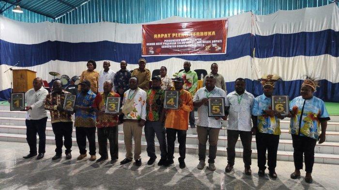 Enam pasangan calon Bupati dan Wakil Bupati Dogiyai resmi ditetapkan di Kantor KPU Dogiyai, Senin (23/9/2024).