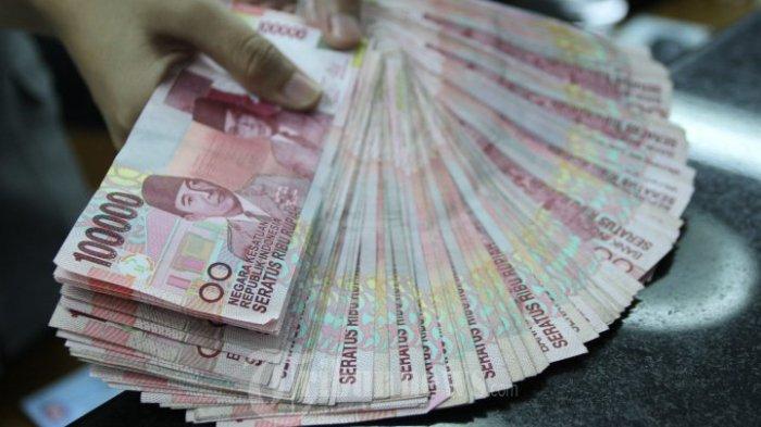RUPIAH - Suasana penukaran uang di Kwitang, Senen, Jakarta Pusat, Kamis (23/7/2015).