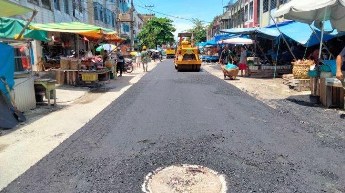 Pekerjaan pengembalian kondisi aspal jalan pasca pembangunan jaringan IPAL