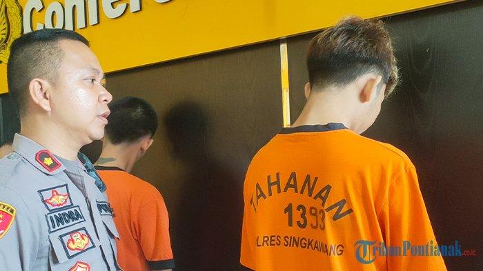 Salah satu Disc Jockey (Dj) terkenal Kota Singkawang, ASS alias AANG (kanan) saat diinterogasi oleh Wakapolres Singkawang, Kompol Indra Asrianto (kiri) setelah pers release di Mapolres Singkawang, Kalimantan Barat, Senin 23 Juli 2023. Kasat Narkoba Polres Singkawang Iptu Dwi Hariyanto Putro menuturkan kronologi penangkapan AANG bermula dari informasi masyarakat bahwa yang bersangkutan ada membawa narkotika