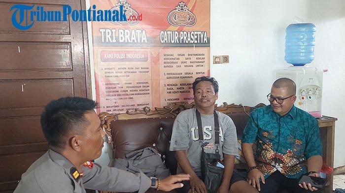 Petugas Kepolisian saat menanyai supir truk konteiner yang truknya mundur tidak kuat menanjak jembatan kapuas 2 Kubu Raya, jumat 7 Juni 2024. Tribun Pontianak Ferryanto.