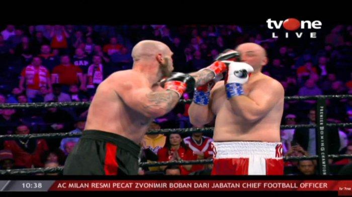 Screenshot cuplikan Tinju Adam Kownacki vs Robert Helenius. Helenius menjadi pemegang sabuk WBA Gold usai mengalahkan Adam Kownacki