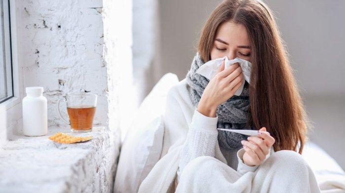 Ilustrasi seseorang terkena virus flu.
