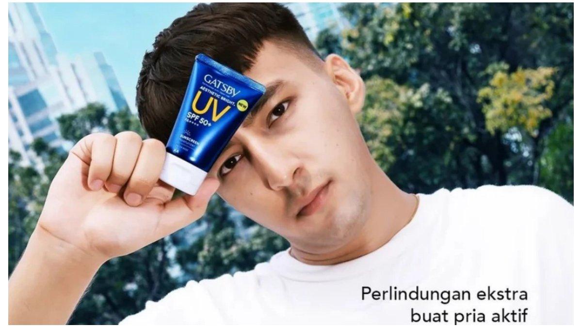 Ilustrasi penggunaan sunscreen pada wajah pria.