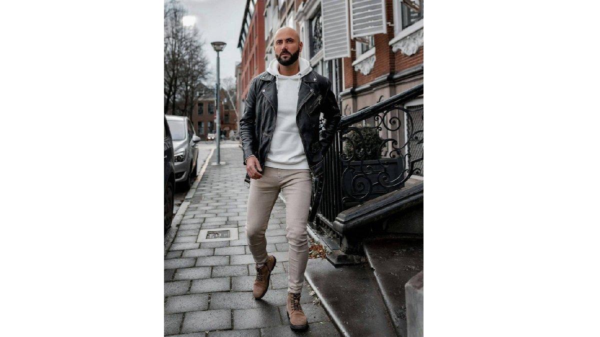 Ide Outfit Sepatu Boots dengan Leather Jacket, Hoodie, dan Skinny Pants.