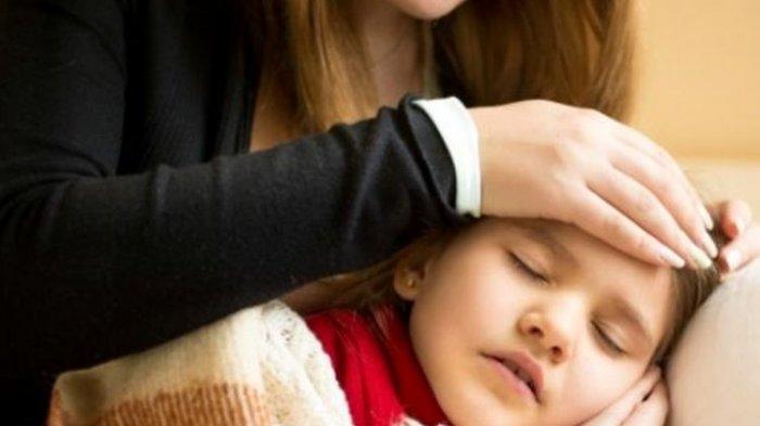 Ilustrasi seorang anak yang mengalami demam.