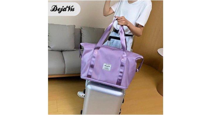 DejaVu Travel Bag Waterproof TTB02 dengan material anti air cocok temani mudik