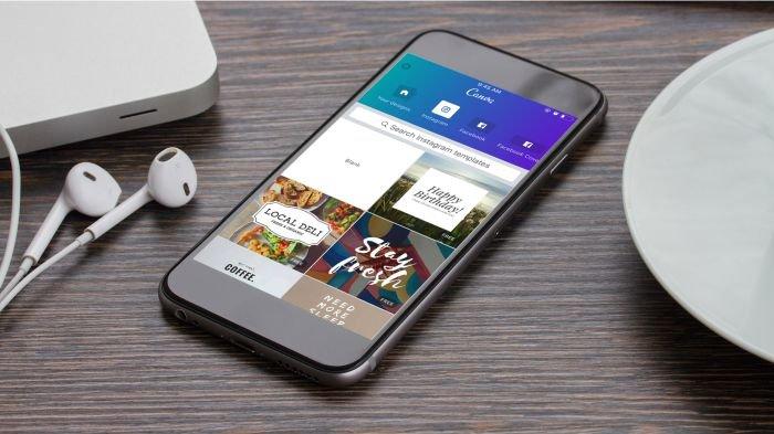 Ilustasi HP dipakai membuka aplikasi Canva