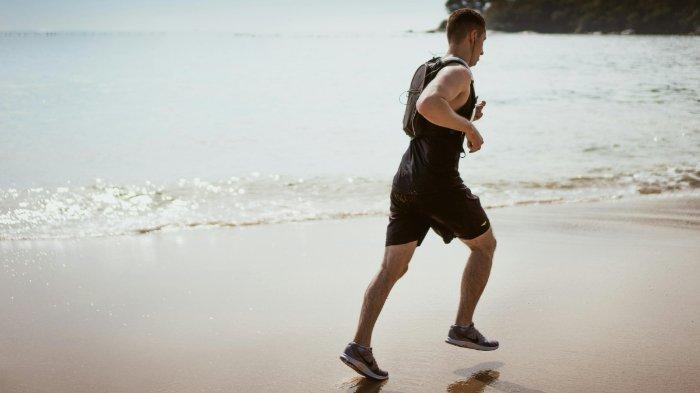 Ilustrasi seorang pria sedang jogging.