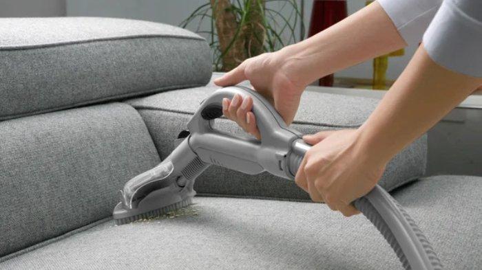 Ilustrasi vacuum cleaner untuk membersihkan debu dan tungau secara lebih mudah.