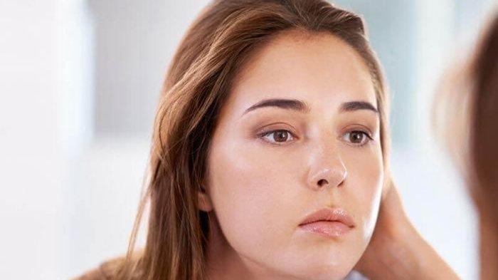 Ilustrasi wajah berminyak.