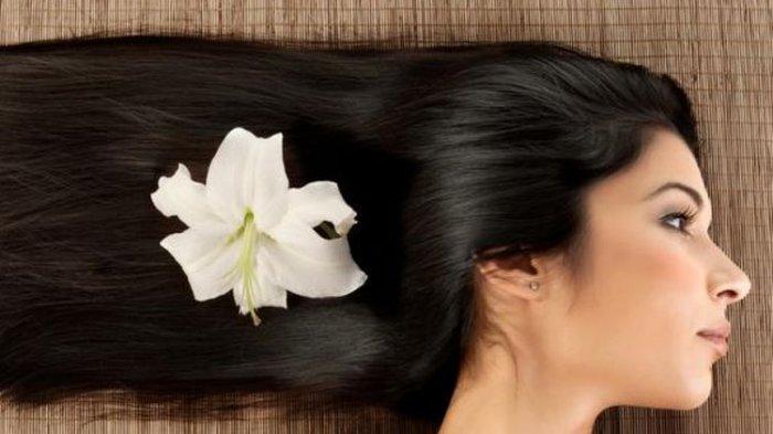 Ilustrasi wanita dengan rambut tebal.