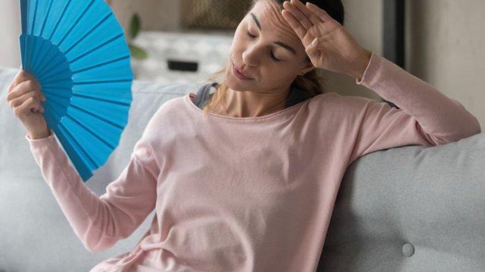 Ilustrasi seseorang berada di ruangan yang panas