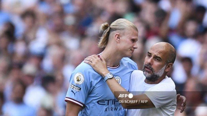 Pep Guardiola menyambut Erling Haaland (Oli Scarff / AFP)