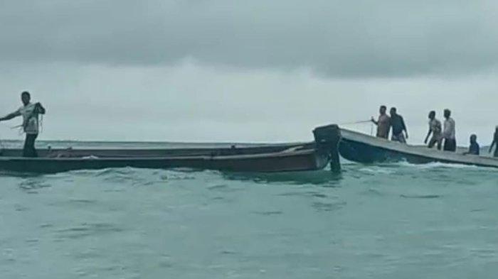 PROSES EVAKUASI. Warga di Maluku Tenggara ikut mencari sejumlah mahasiswa Universitas UGM yang tenggelam usai longboat yang mereka tumpangi tenggelam di laut Maluku Tenggara, Selasa (1/7/2025). 2 Mahasiswa UGM meninggal dalam kecelakaan ini. (Basarnas Ambon)