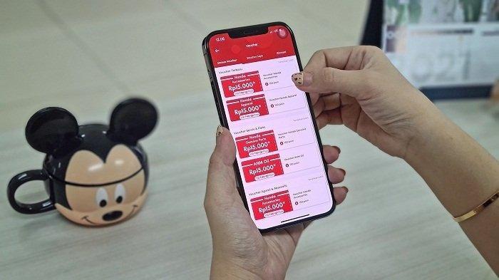 Pengguna aplikasi Motorku X membuka fitur Hepigo Poin.